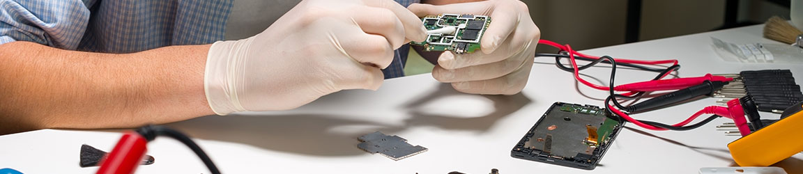 Electrical engineer working on a mobile device