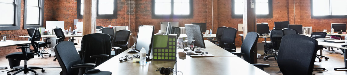 empty office with desks and chairs