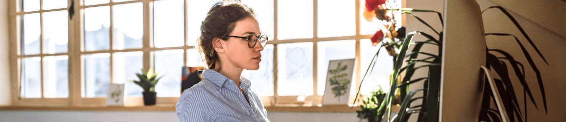 woman looking at desktop