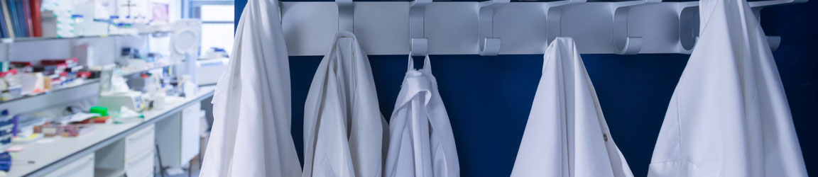 White coats hanging in a laboratory