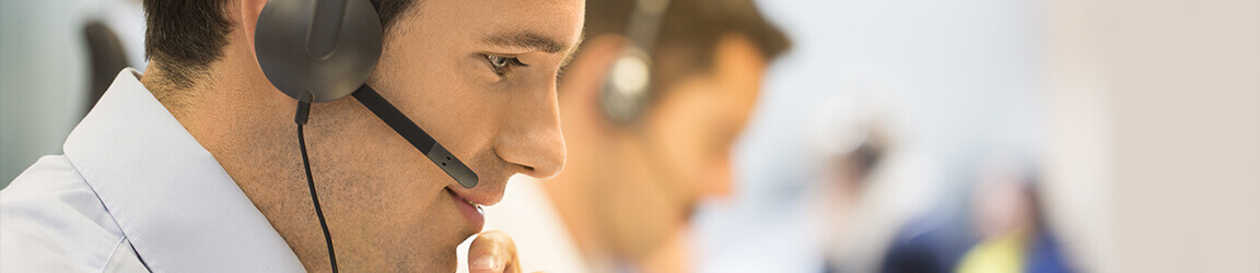 Male call center operator with headset