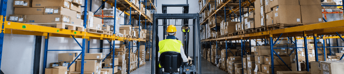 forklift driver inside a warehouse