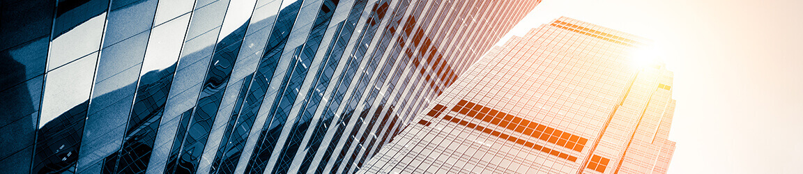 Ground-level view of tall buildings