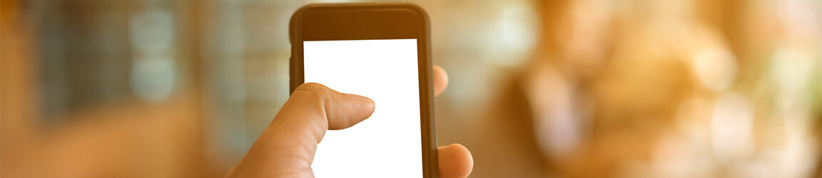 Person holding cellphone that is facing the camera