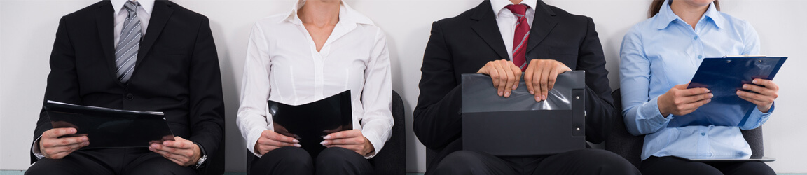 Professionals sitting and holding documents