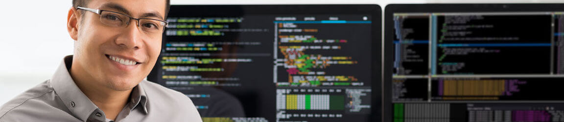 engineer with computer code in background