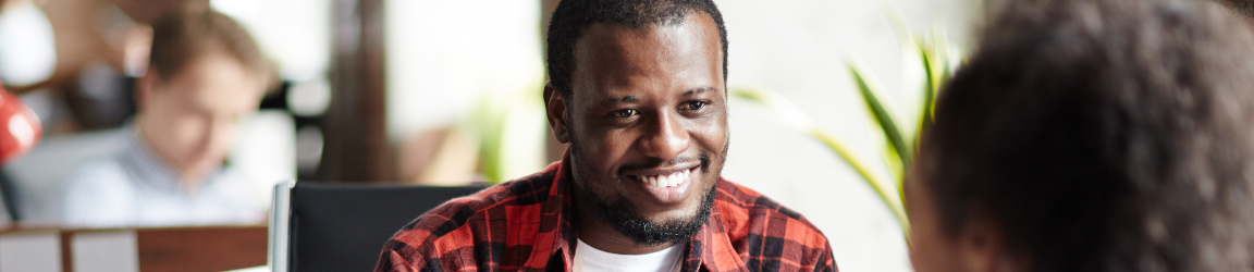 Man smiling during job interview