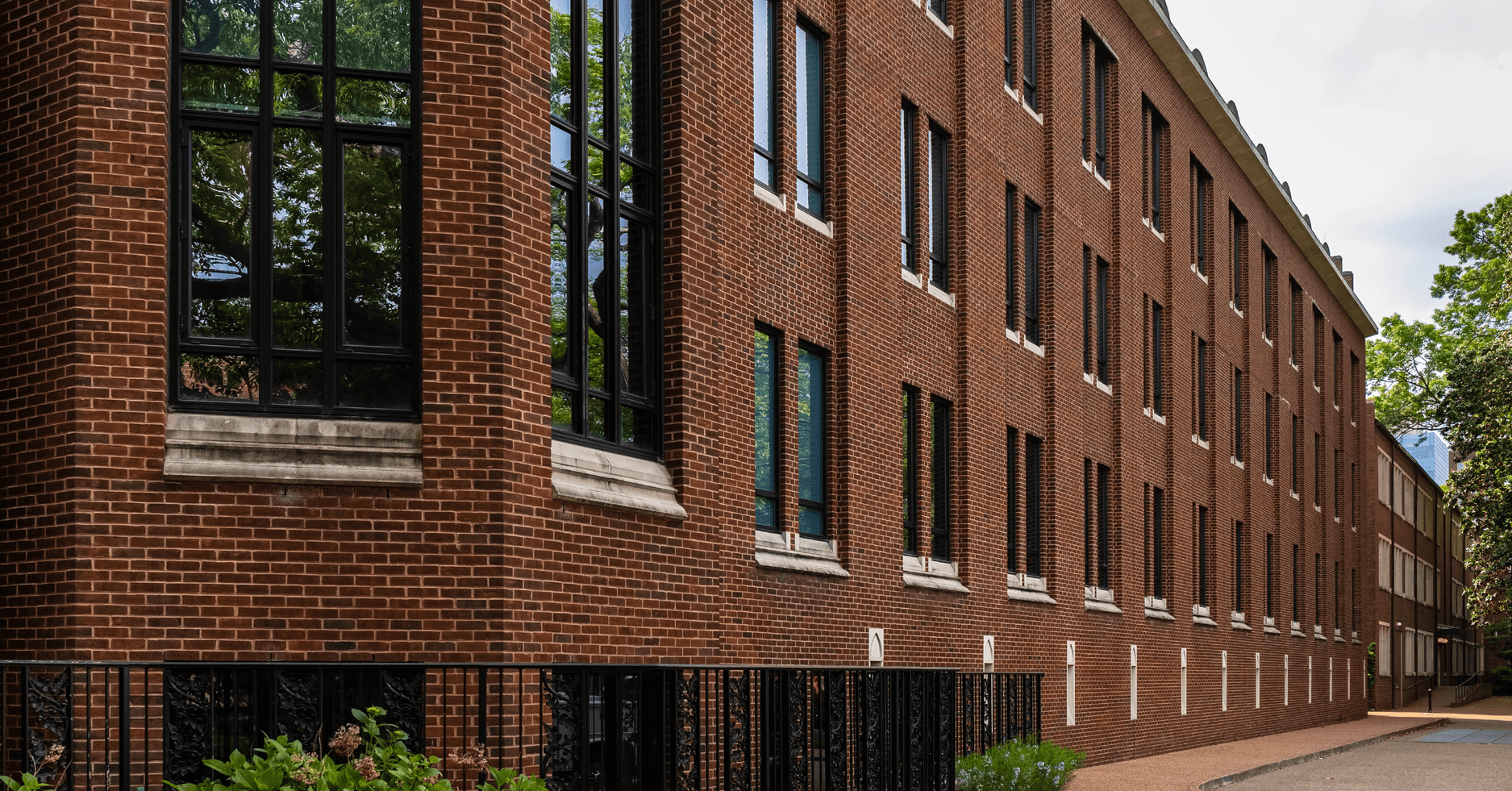 The brick facade of an educational building.