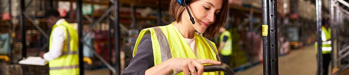 Warehouse worker scanning box