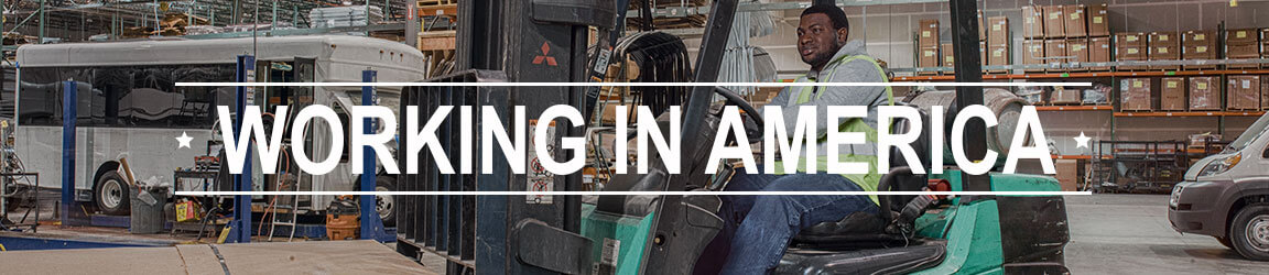 Inside of a warehouse with Working in America text overlay on image