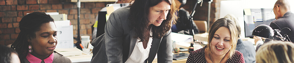 Women working in a casual office space.